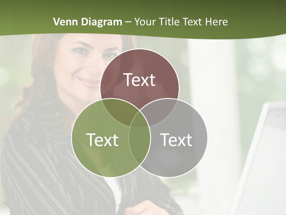 A Woman Sitting At A Desk With A Laptop PowerPoint Template