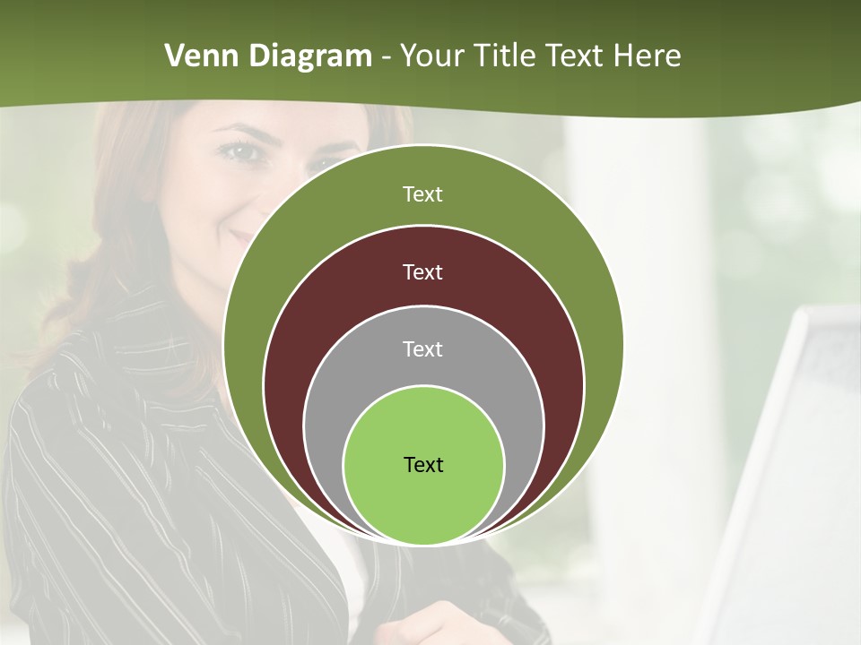 A Woman Sitting At A Desk With A Laptop PowerPoint Template