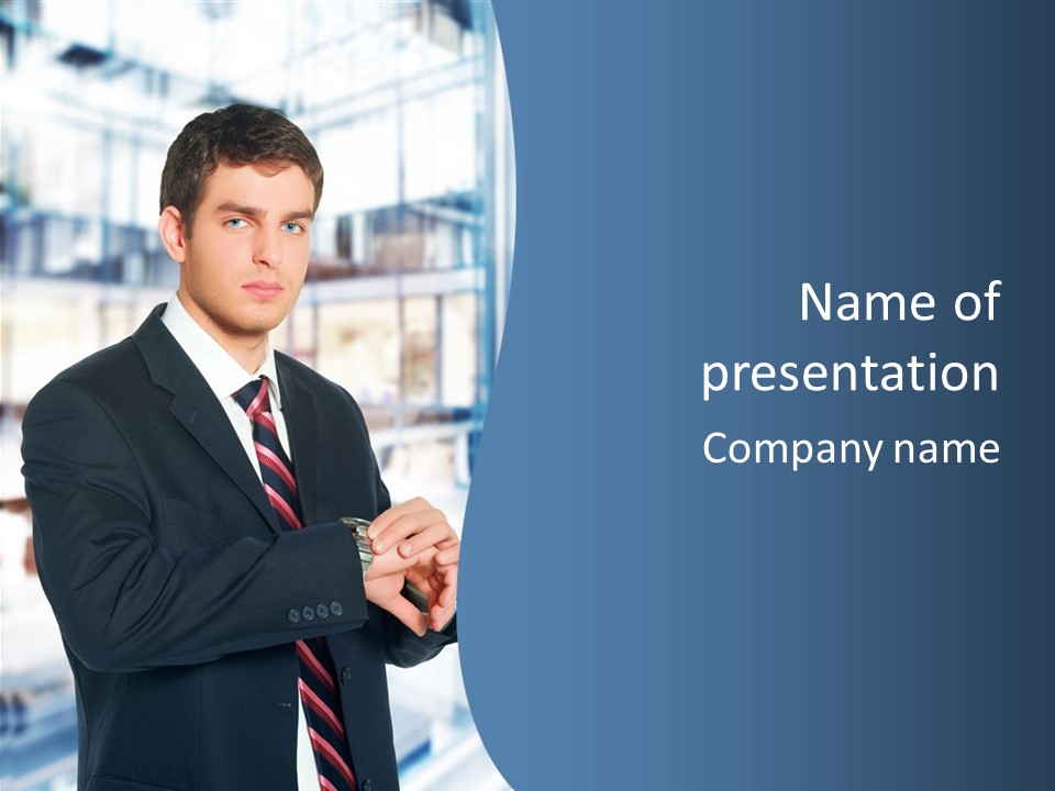 A Man In A Suit And Tie Standing In Front Of A Building PowerPoint Template