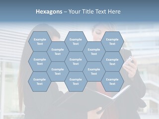 Two Women In Business Attire Looking At A Cell Phone PowerPoint Template