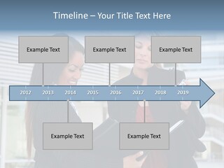 Two Women In Business Attire Looking At A Cell Phone PowerPoint Template