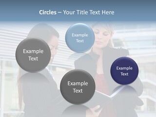 Two Women In Business Attire Looking At A Cell Phone PowerPoint Template