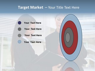 Two Women In Business Attire Looking At A Cell Phone PowerPoint Template