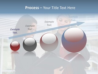 Two Women In Business Attire Looking At A Cell Phone PowerPoint Template