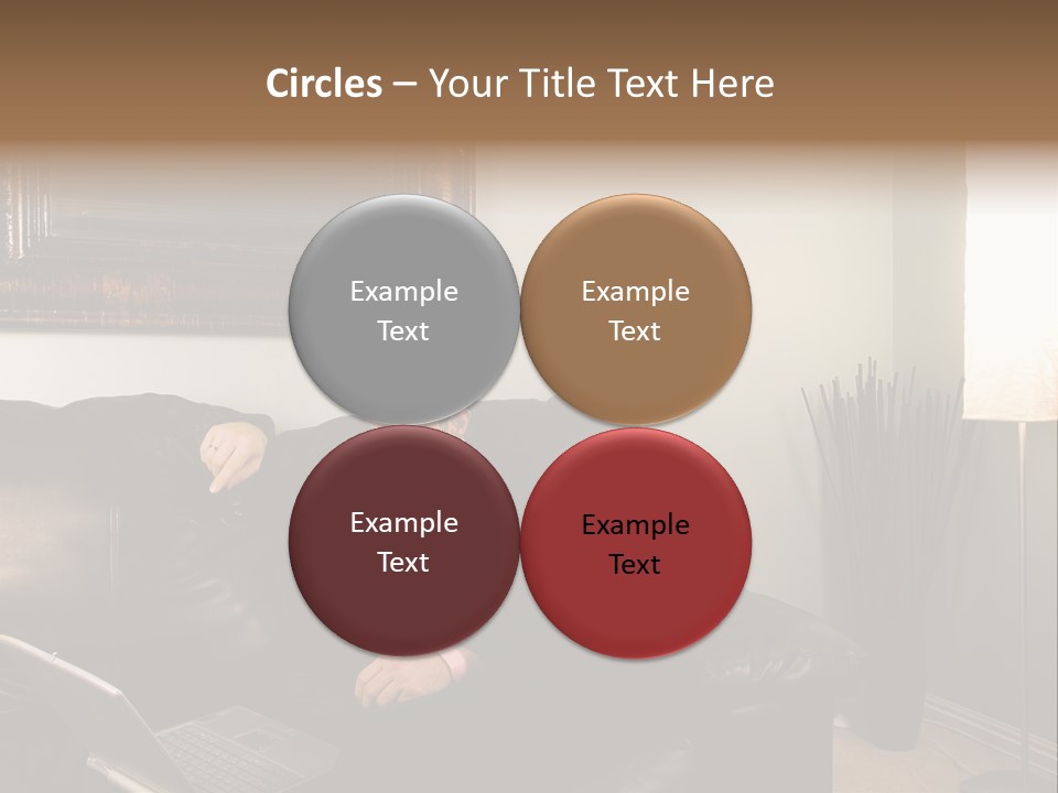 A Man Sitting On A Couch In A Living Room PowerPoint Template