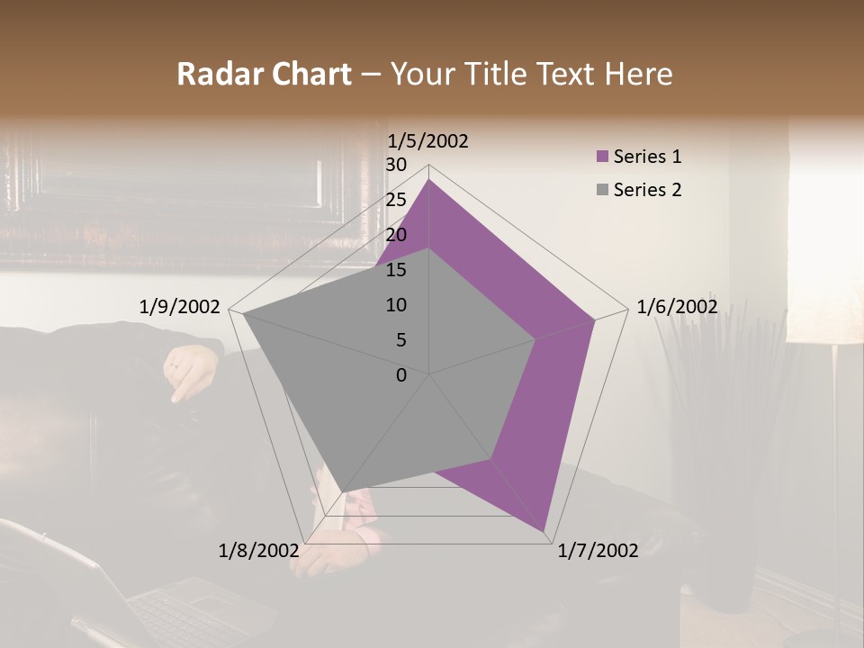 A Man Sitting On A Couch In A Living Room PowerPoint Template