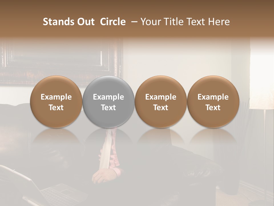 A Man Sitting On A Couch In A Living Room PowerPoint Template