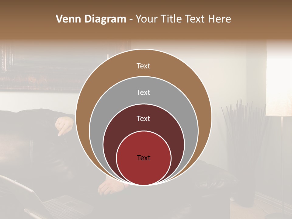 A Man Sitting On A Couch In A Living Room PowerPoint Template