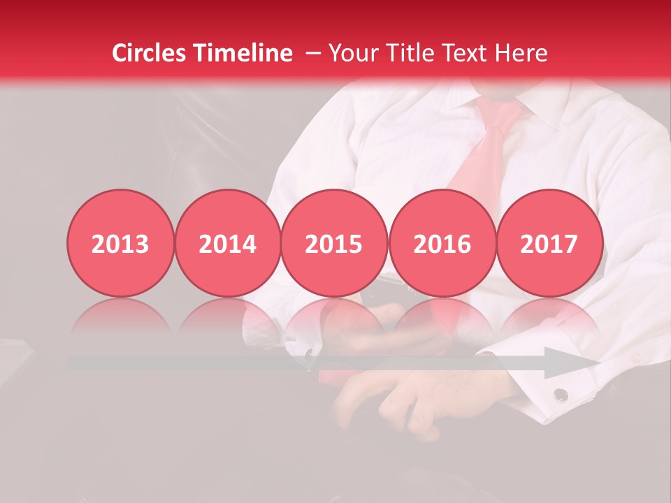 A Man Sitting In A Chair With A Cell Phone PowerPoint Template