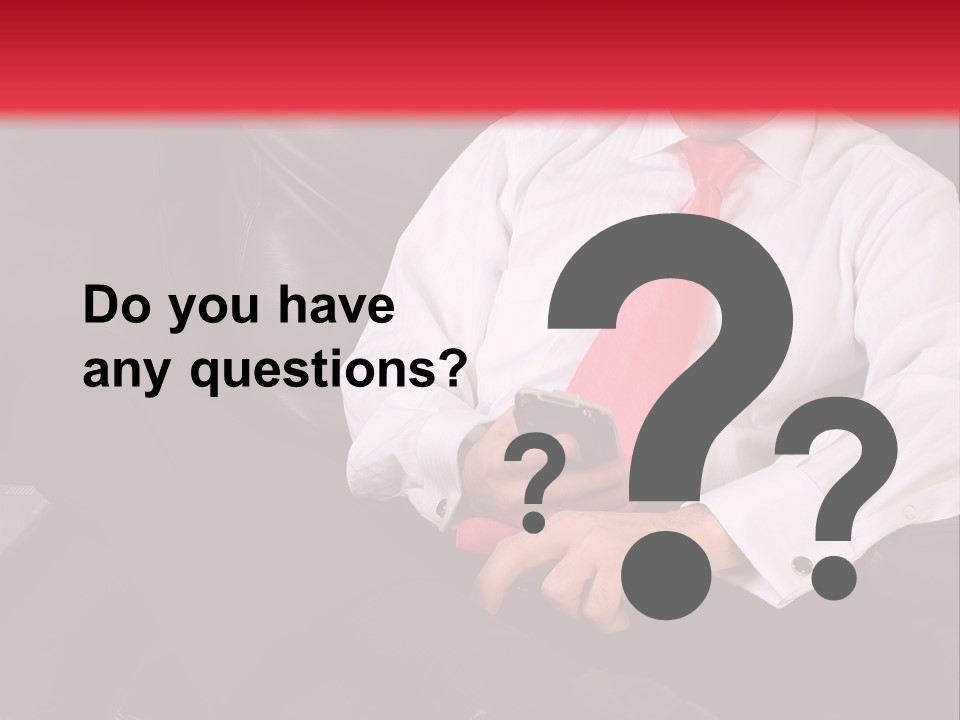 A Man Sitting In A Chair With A Cell Phone PowerPoint Template