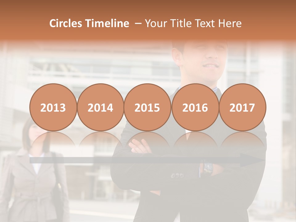 A Man In A Suit Standing With His Arms Crossed PowerPoint Template