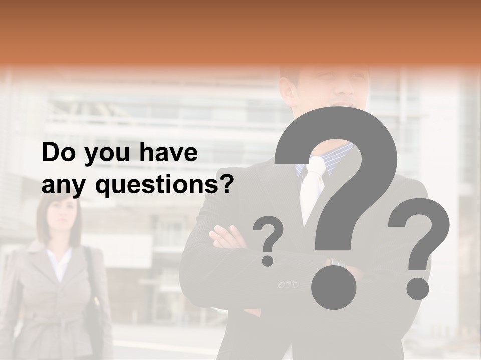 A Man In A Suit Standing With His Arms Crossed PowerPoint Template