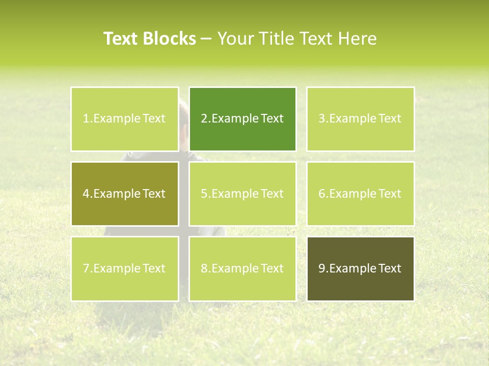 A Young Boy Sitting On The Grass In A Park PowerPoint Template