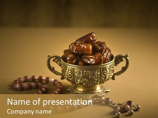 A Bowl Of Dates On A Table With A Rosary PowerPoint Template