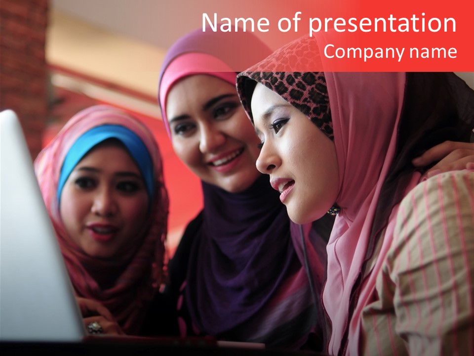 Three Women In Hijabs Look At A Laptop Screen PowerPoint Template