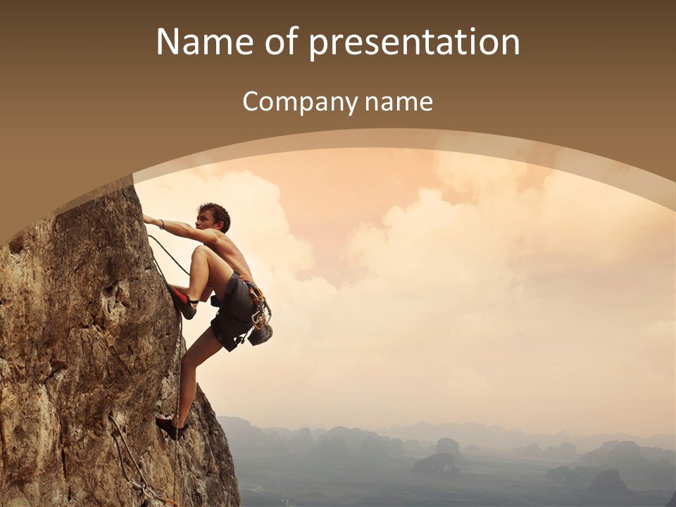 A Man Climbing Up The Side Of A Mountain PowerPoint Template