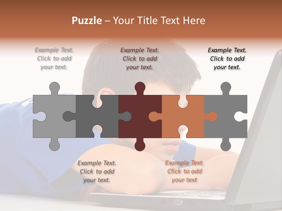 A Young Boy Laying On His Stomach Using A Laptop PowerPoint Template