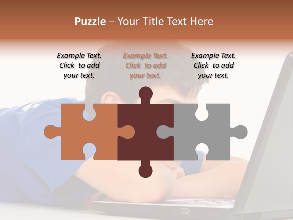 A Young Boy Laying On His Stomach Using A Laptop PowerPoint Template