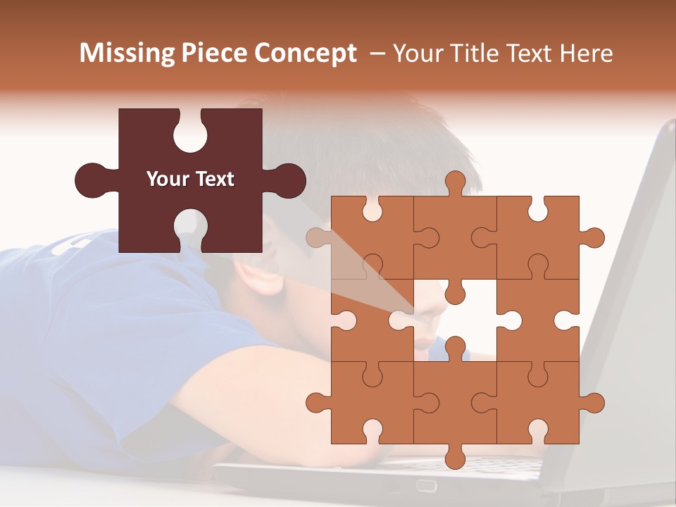 A Young Boy Laying On His Stomach Using A Laptop PowerPoint Template