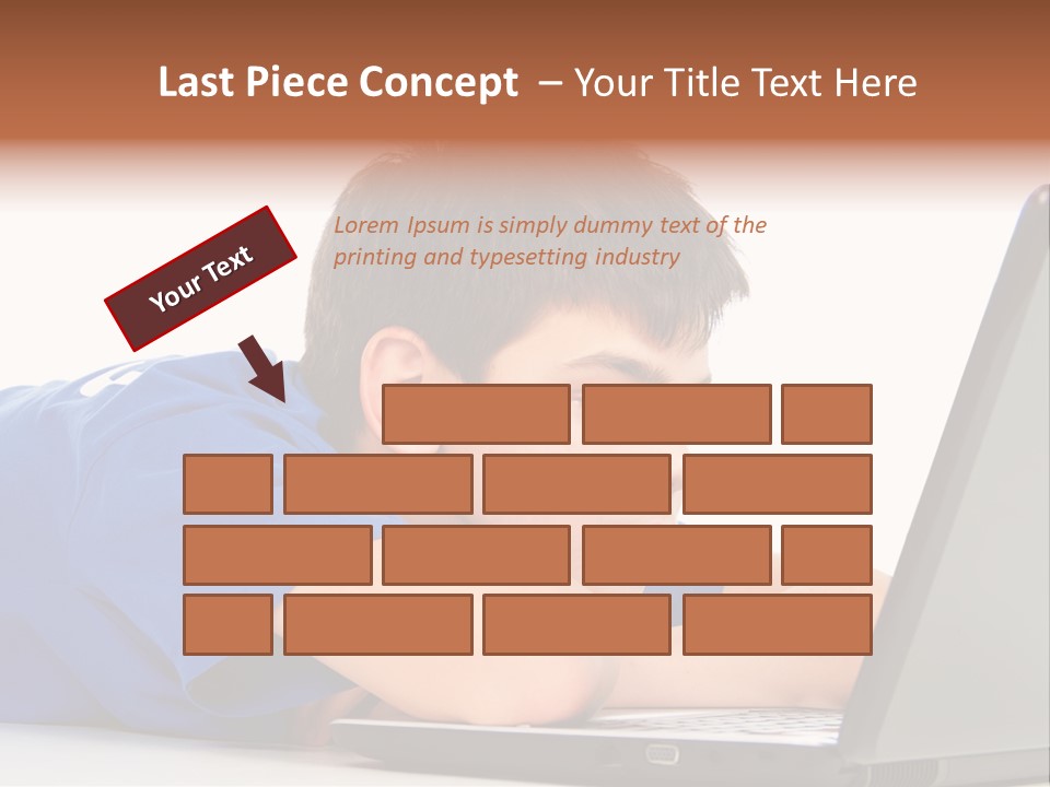 A Young Boy Laying On His Stomach Using A Laptop PowerPoint Template