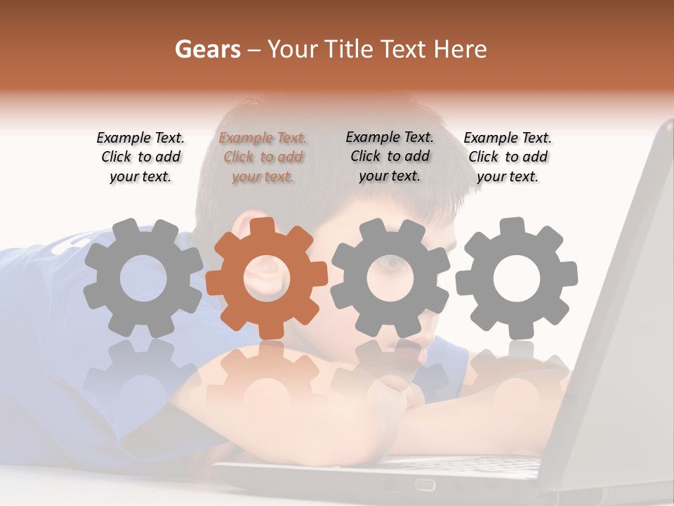 A Young Boy Laying On His Stomach Using A Laptop PowerPoint Template