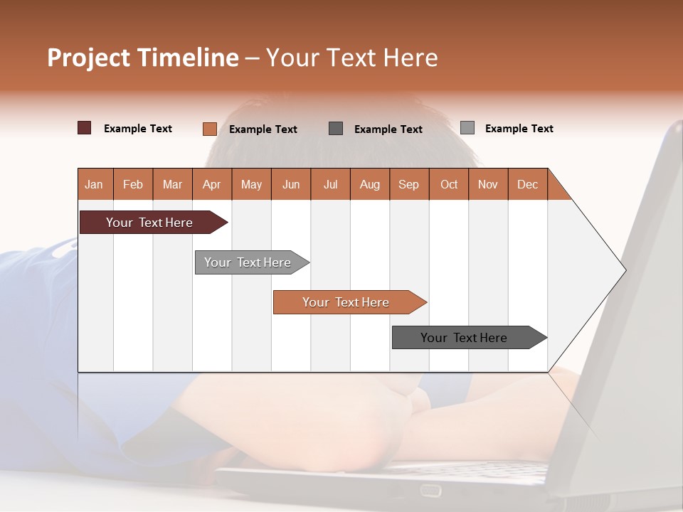 A Young Boy Laying On His Stomach Using A Laptop PowerPoint Template