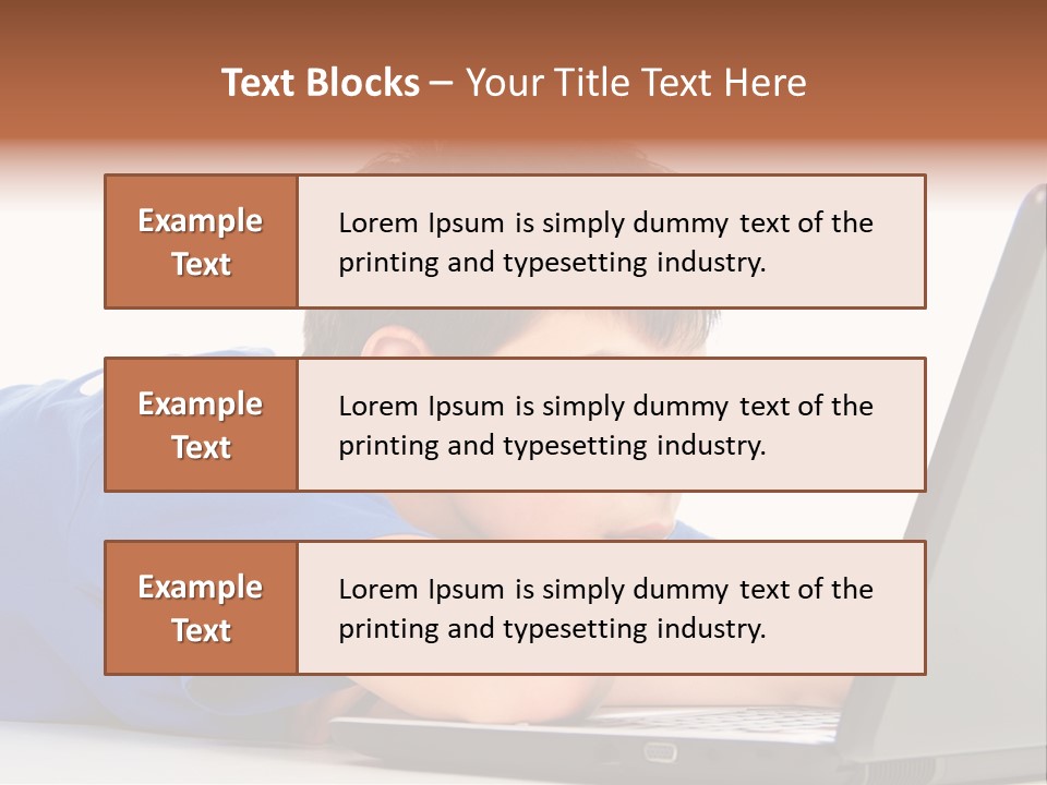 A Young Boy Laying On His Stomach Using A Laptop PowerPoint Template