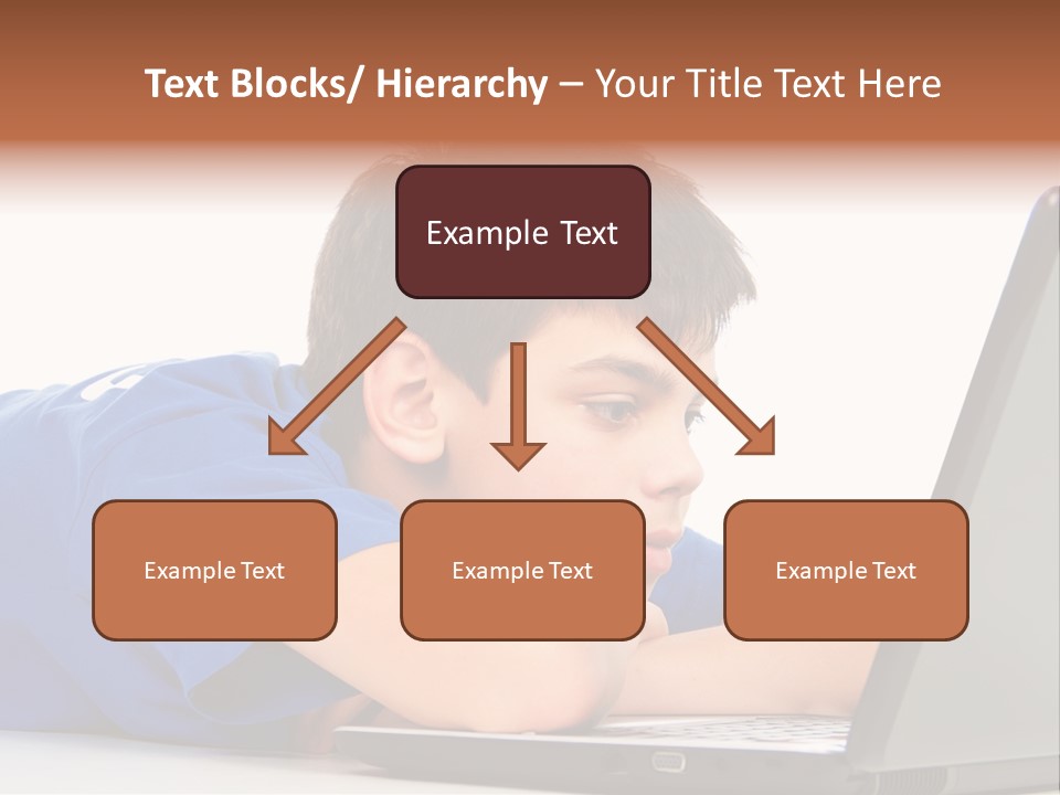 A Young Boy Laying On His Stomach Using A Laptop PowerPoint Template