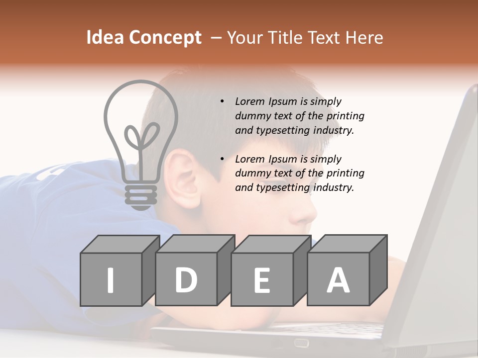 A Young Boy Laying On His Stomach Using A Laptop PowerPoint Template