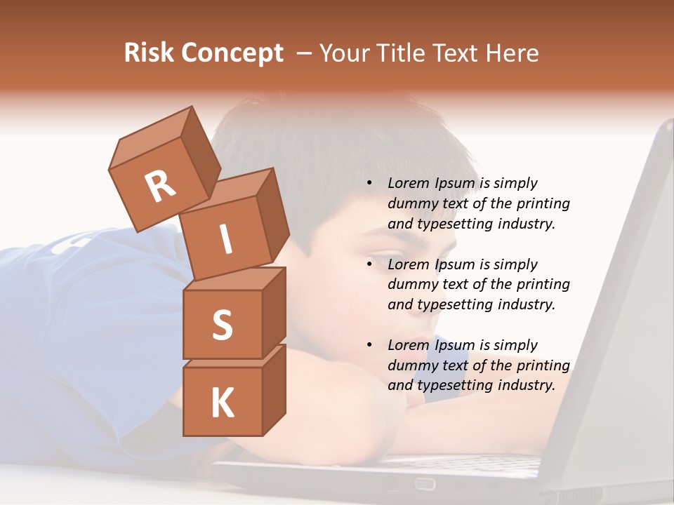 A Young Boy Laying On His Stomach Using A Laptop PowerPoint Template