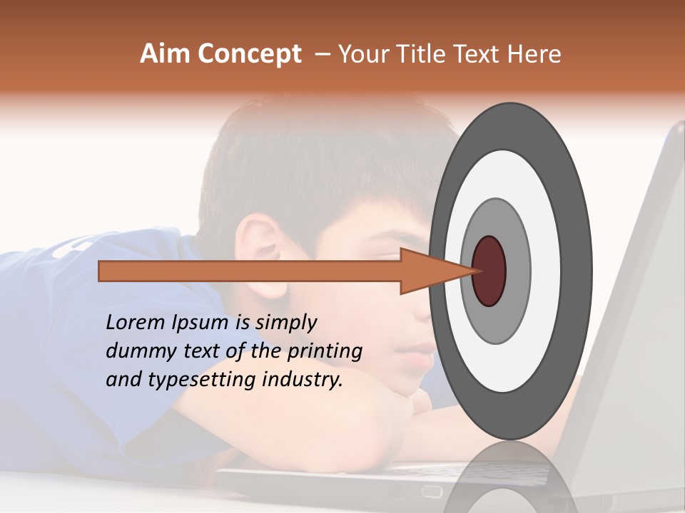 A Young Boy Laying On His Stomach Using A Laptop PowerPoint Template