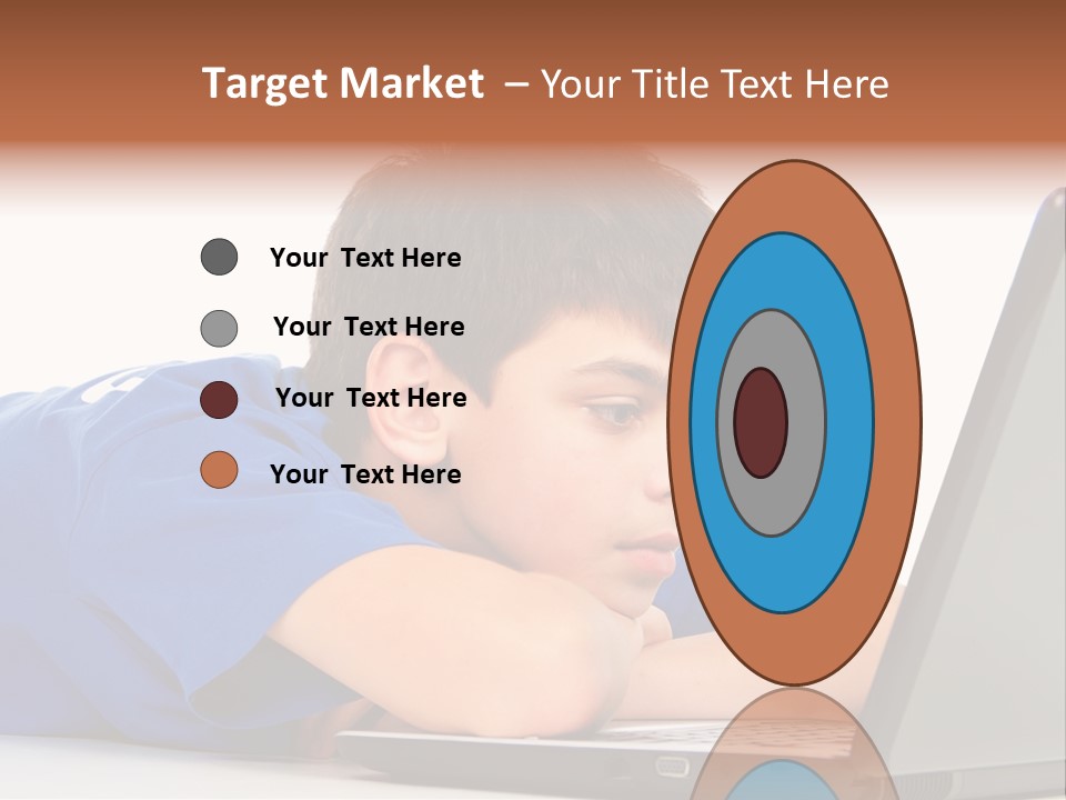 A Young Boy Laying On His Stomach Using A Laptop PowerPoint Template