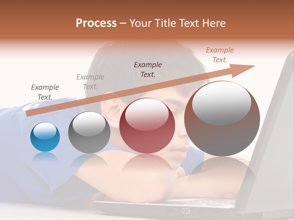 A Young Boy Laying On His Stomach Using A Laptop PowerPoint Template