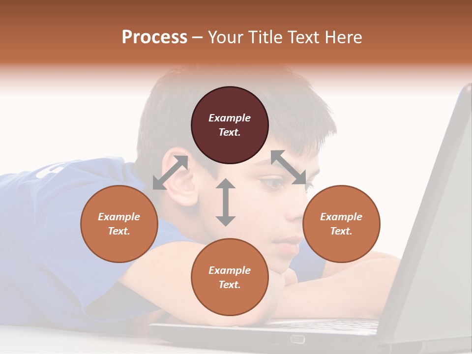 A Young Boy Laying On His Stomach Using A Laptop PowerPoint Template