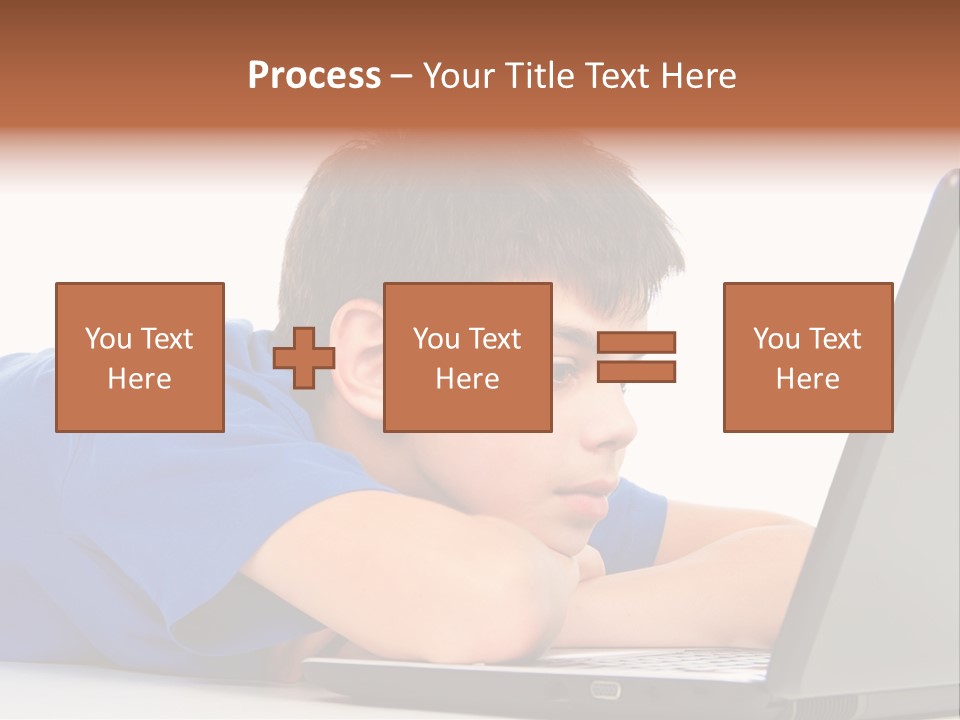 A Young Boy Laying On His Stomach Using A Laptop PowerPoint Template
