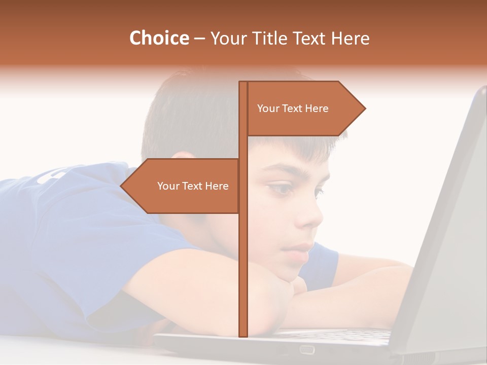 A Young Boy Laying On His Stomach Using A Laptop PowerPoint Template