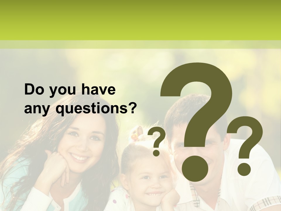 A Family Laying In The Grass With A Green Background PowerPoint Template