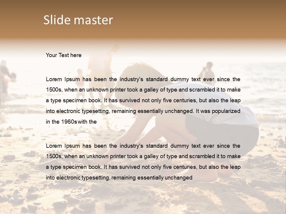 A Young Boy Playing In The Sand At The Beach PowerPoint Template