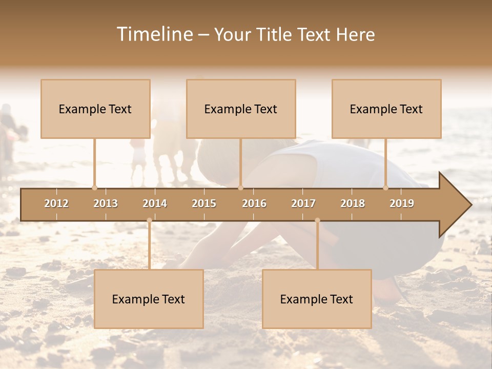 A Young Boy Playing In The Sand At The Beach PowerPoint Template