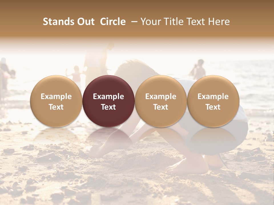 A Young Boy Playing In The Sand At The Beach PowerPoint Template