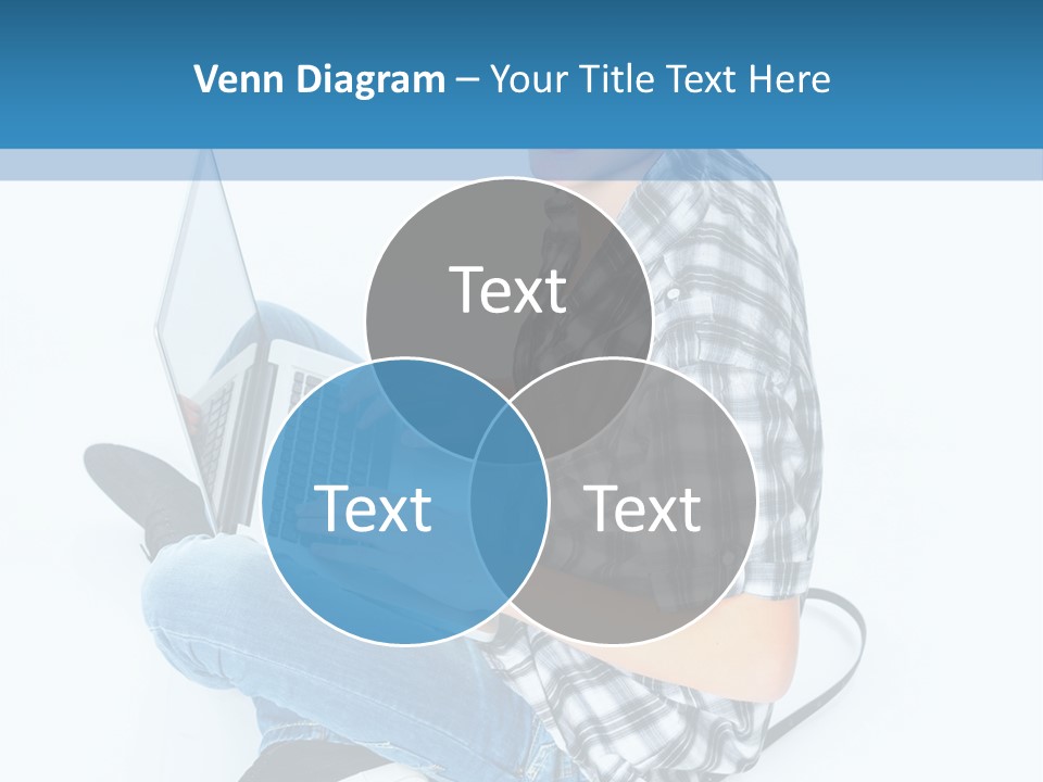 A Young Man Sitting On The Floor Using A Laptop Computer PowerPoint Template