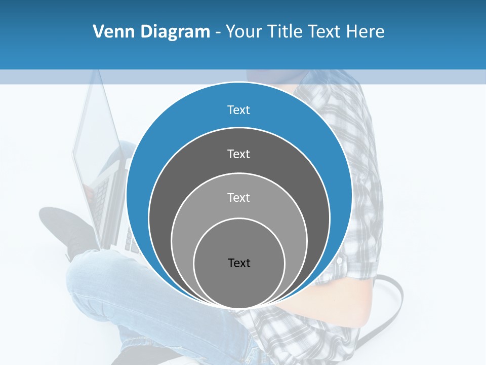 A Young Man Sitting On The Floor Using A Laptop Computer PowerPoint Template