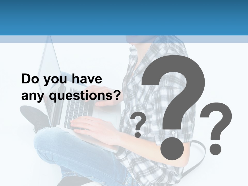 A Young Man Sitting On The Floor Using A Laptop Computer PowerPoint Template