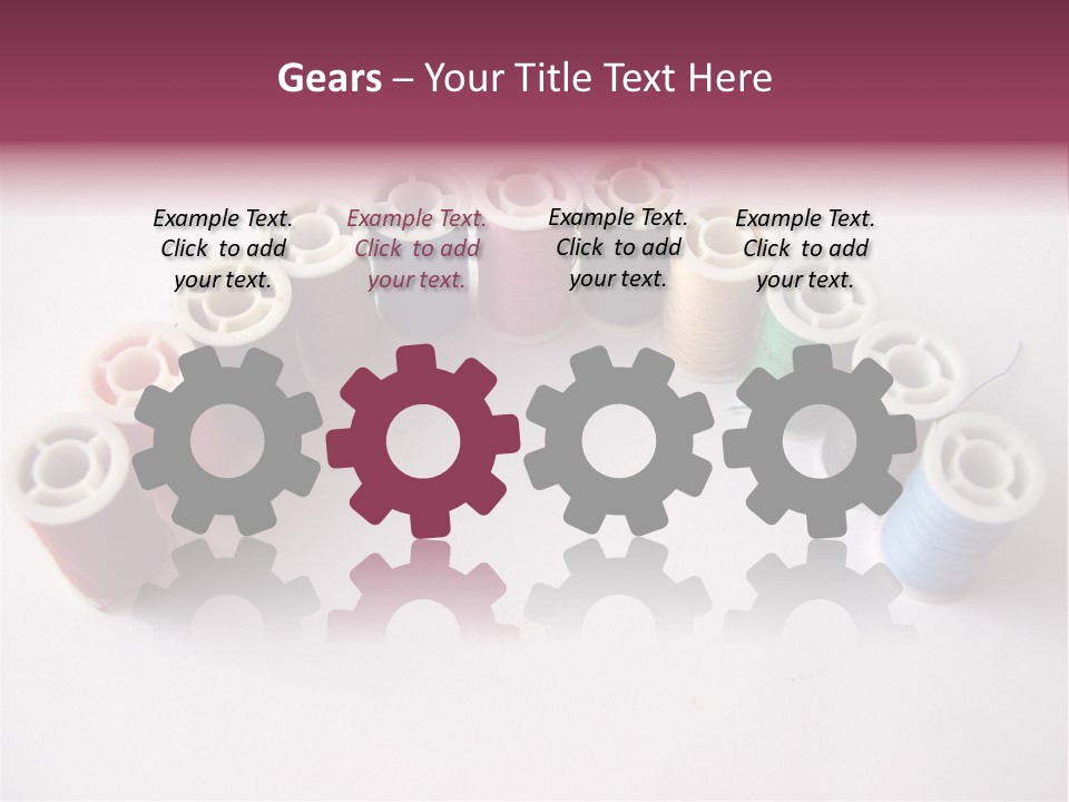 A Group Of Spools Of Thread On A White Surface PowerPoint Template