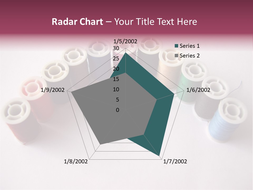 A Group Of Spools Of Thread On A White Surface PowerPoint Template
