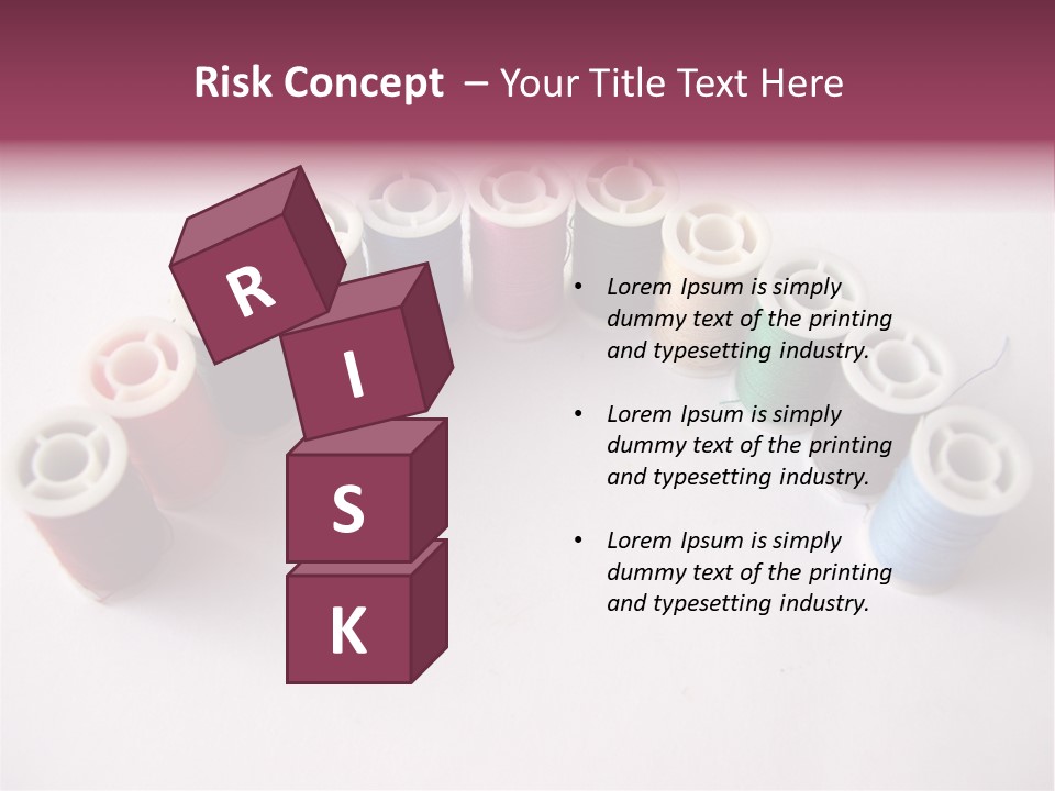 A Group Of Spools Of Thread On A White Surface PowerPoint Template