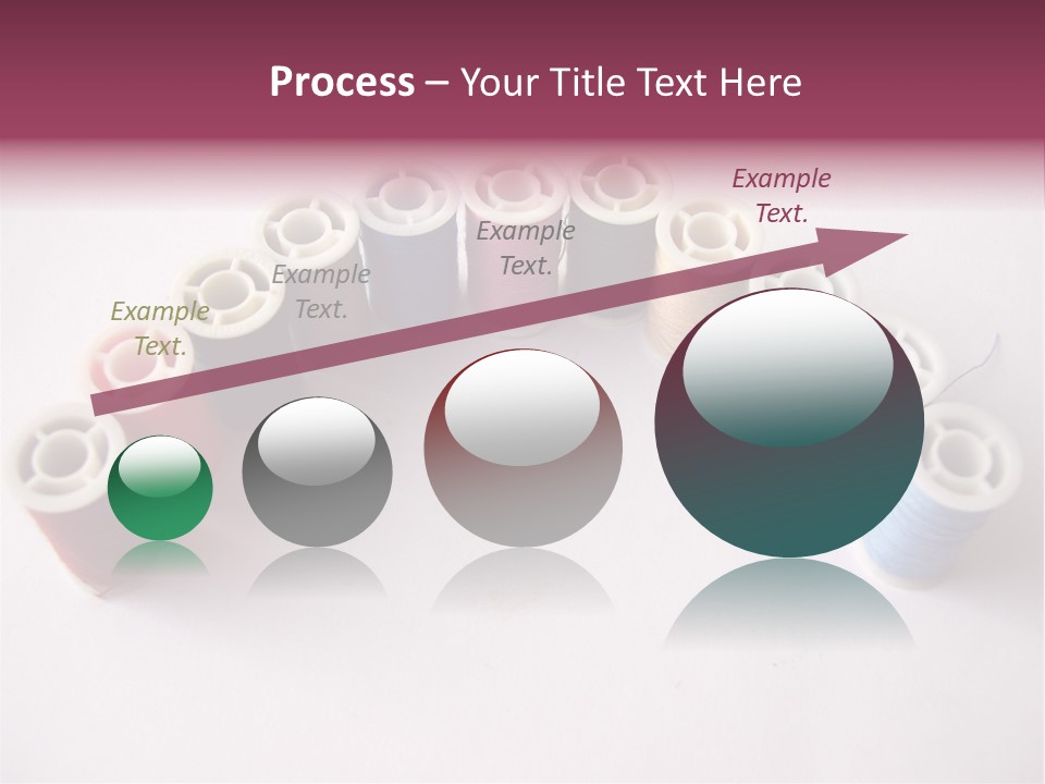 A Group Of Spools Of Thread On A White Surface PowerPoint Template