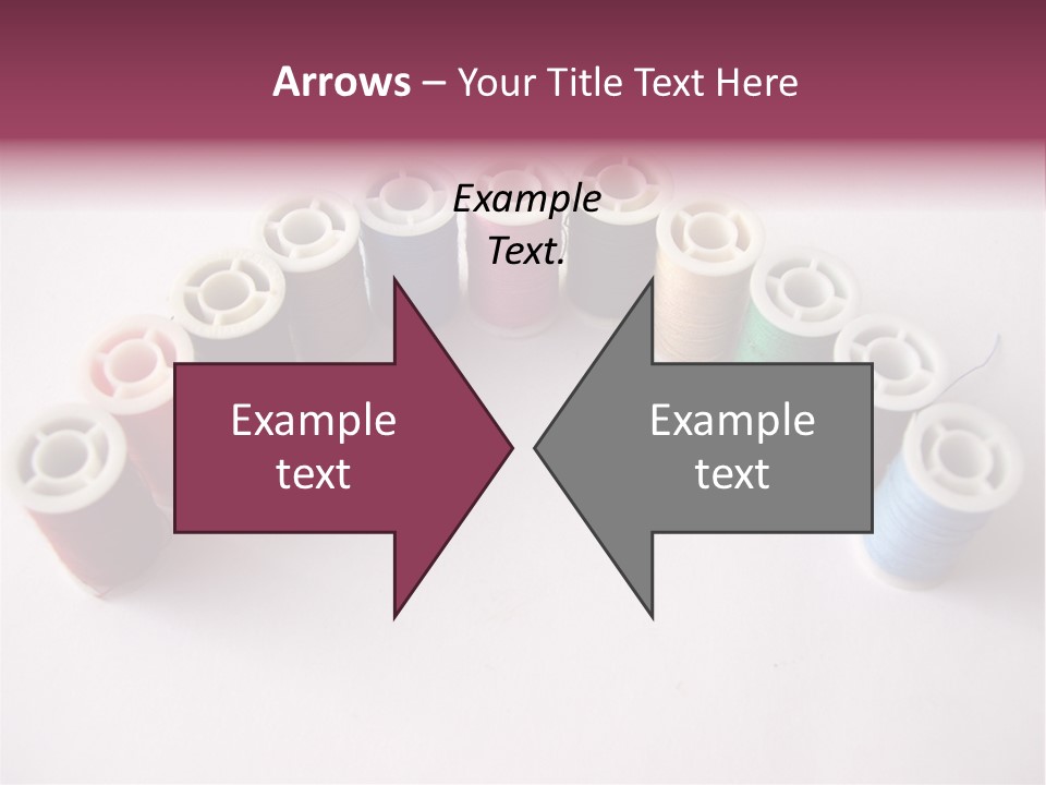 A Group Of Spools Of Thread On A White Surface PowerPoint Template