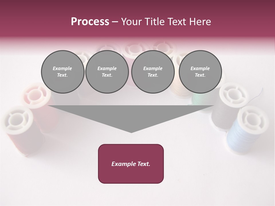 A Group Of Spools Of Thread On A White Surface PowerPoint Template