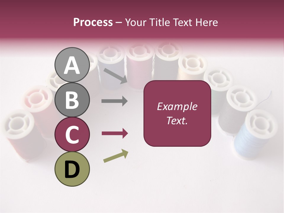 A Group Of Spools Of Thread On A White Surface PowerPoint Template